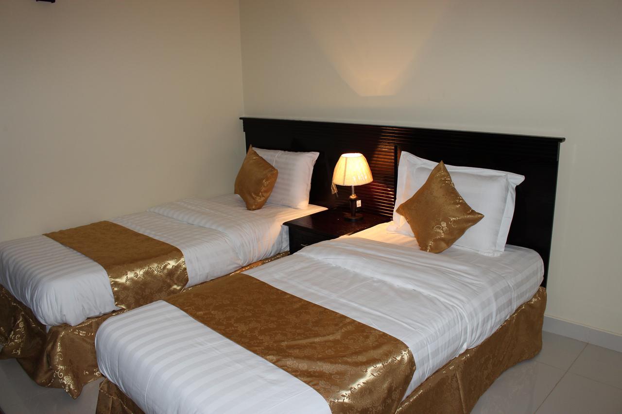 Amyal Alras Aparthotel Al-Ras Esterno foto